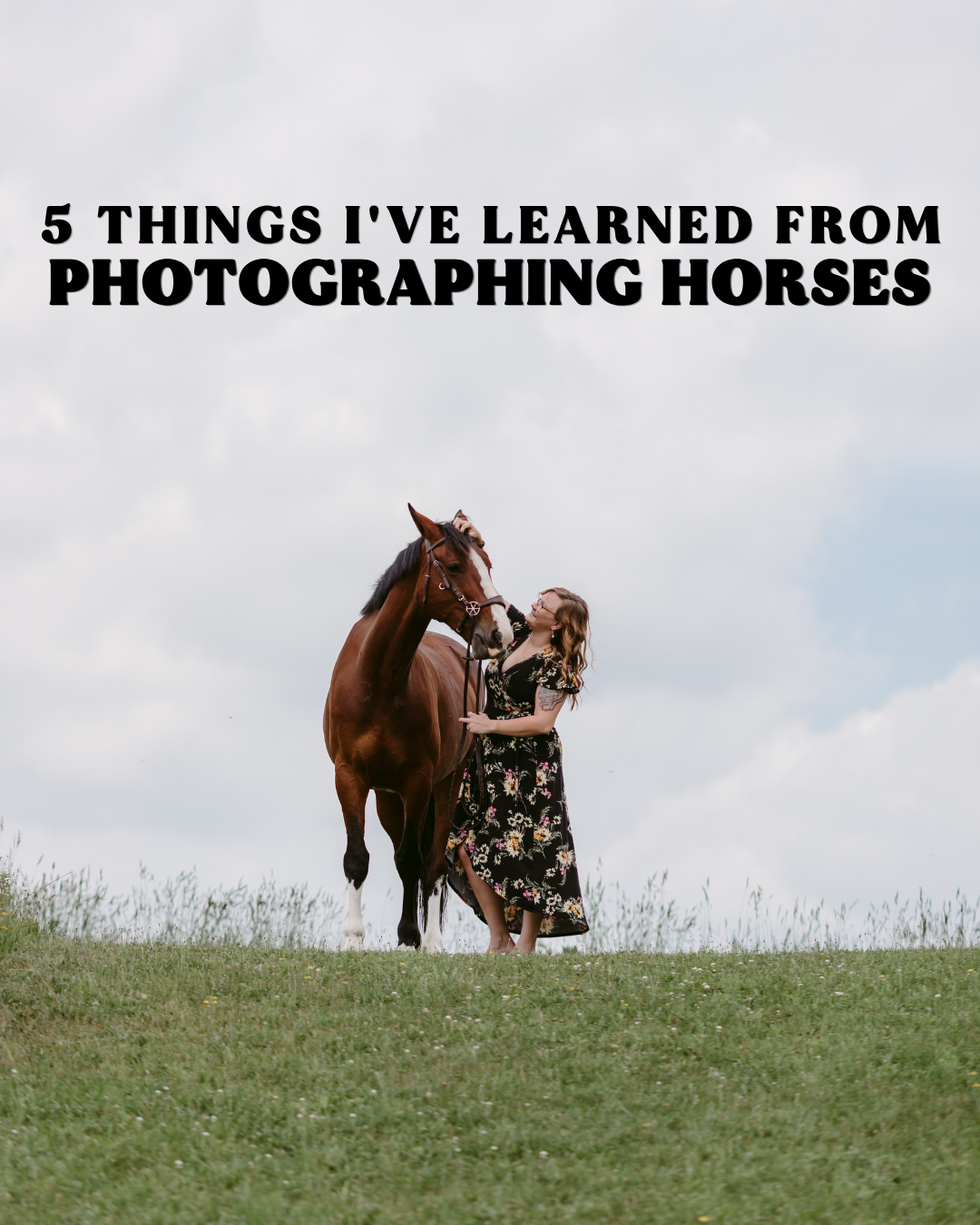 Lady standing with her horse on a grassy hill.