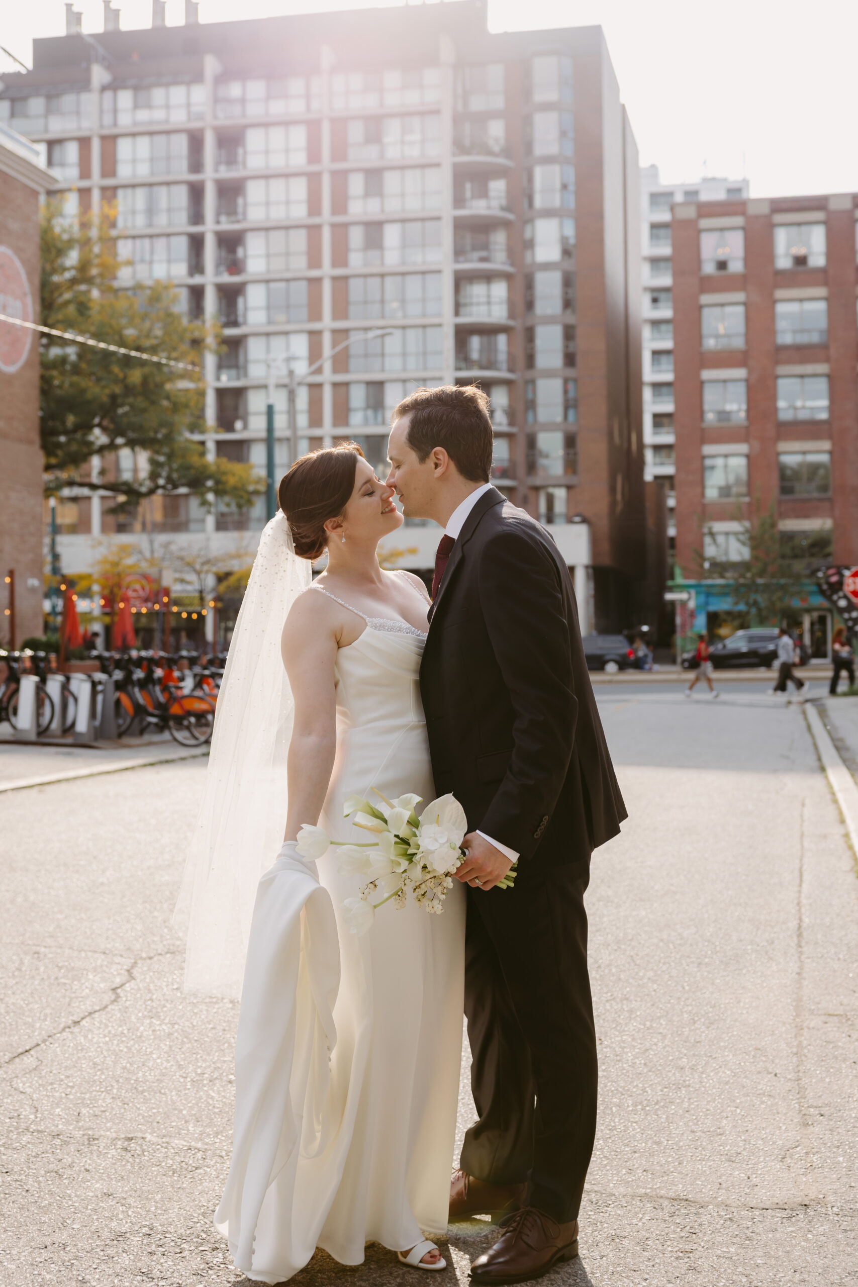 Siobhan and Nicolas exchanging vows at their intimate fall wedding at Hotel Ocho in Toronto