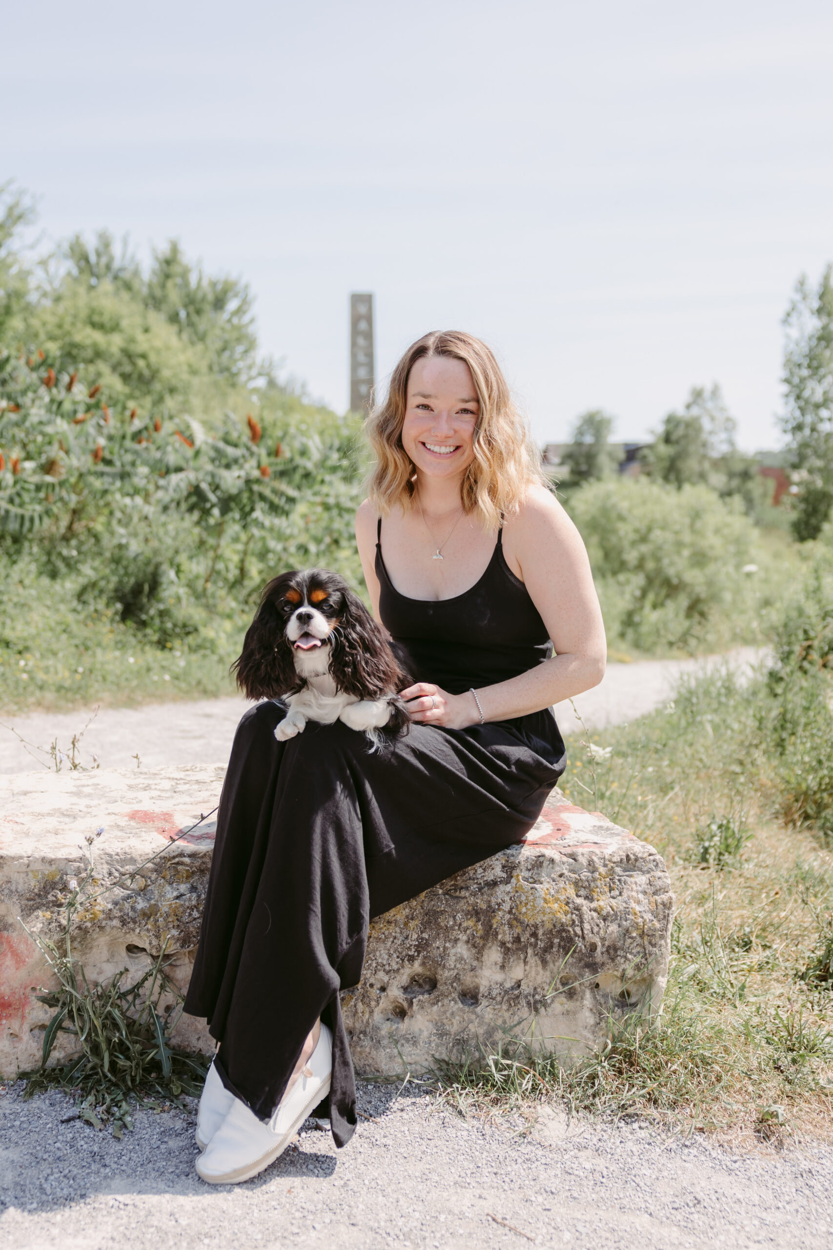 Together with Danielle and her puppy cocker spaniel for their pet photo session at Evergreen Brickworks.
